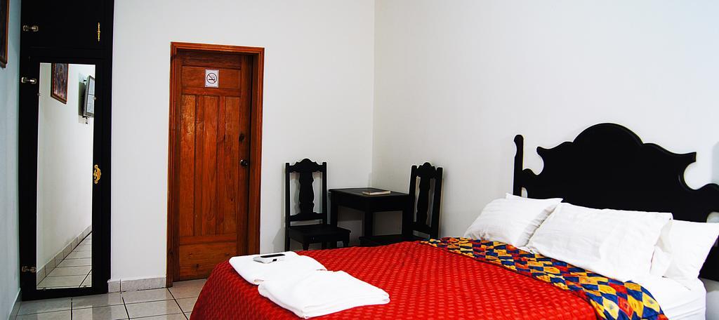 Uw Oasis Hotel La Ceiba Værelse billede