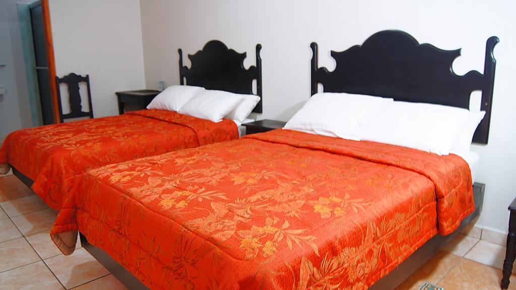 Uw Oasis Hotel La Ceiba Værelse billede
