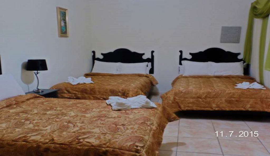 Uw Oasis Hotel La Ceiba Værelse billede